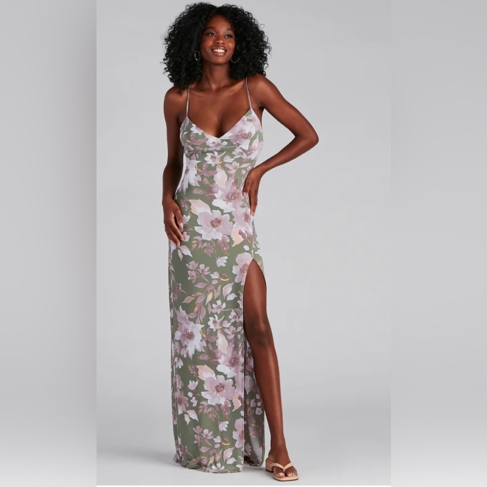 Olive maxi with dusty purple flowers. Slit up the leg.size medium